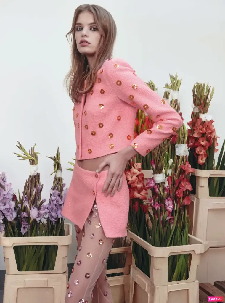 pink jacket with gold flowers