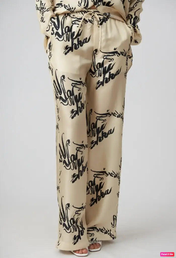 Nanushka cream silk printed pants